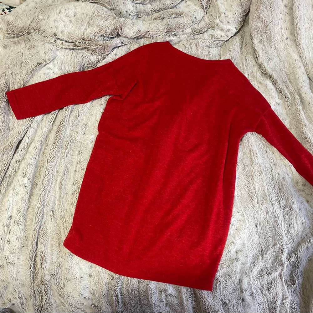 Red knit sweater-dress.